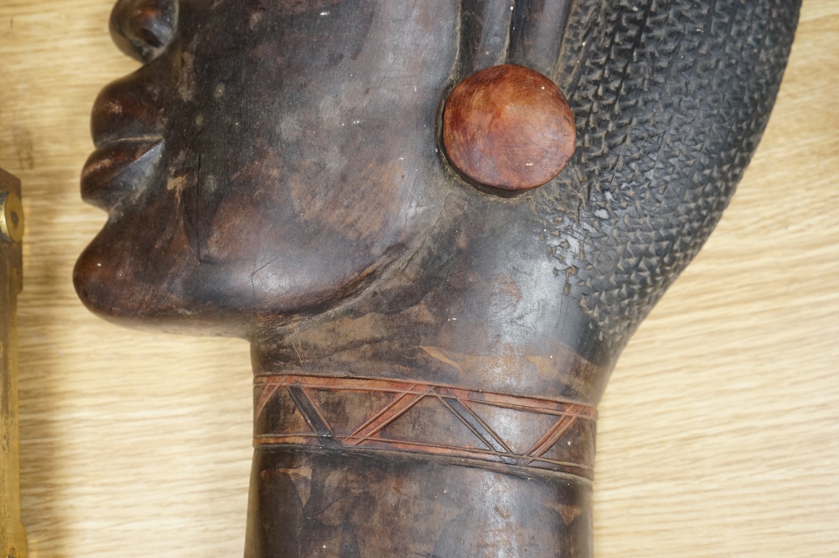 A carved African tribal hardwood wall plaque, 64cm high